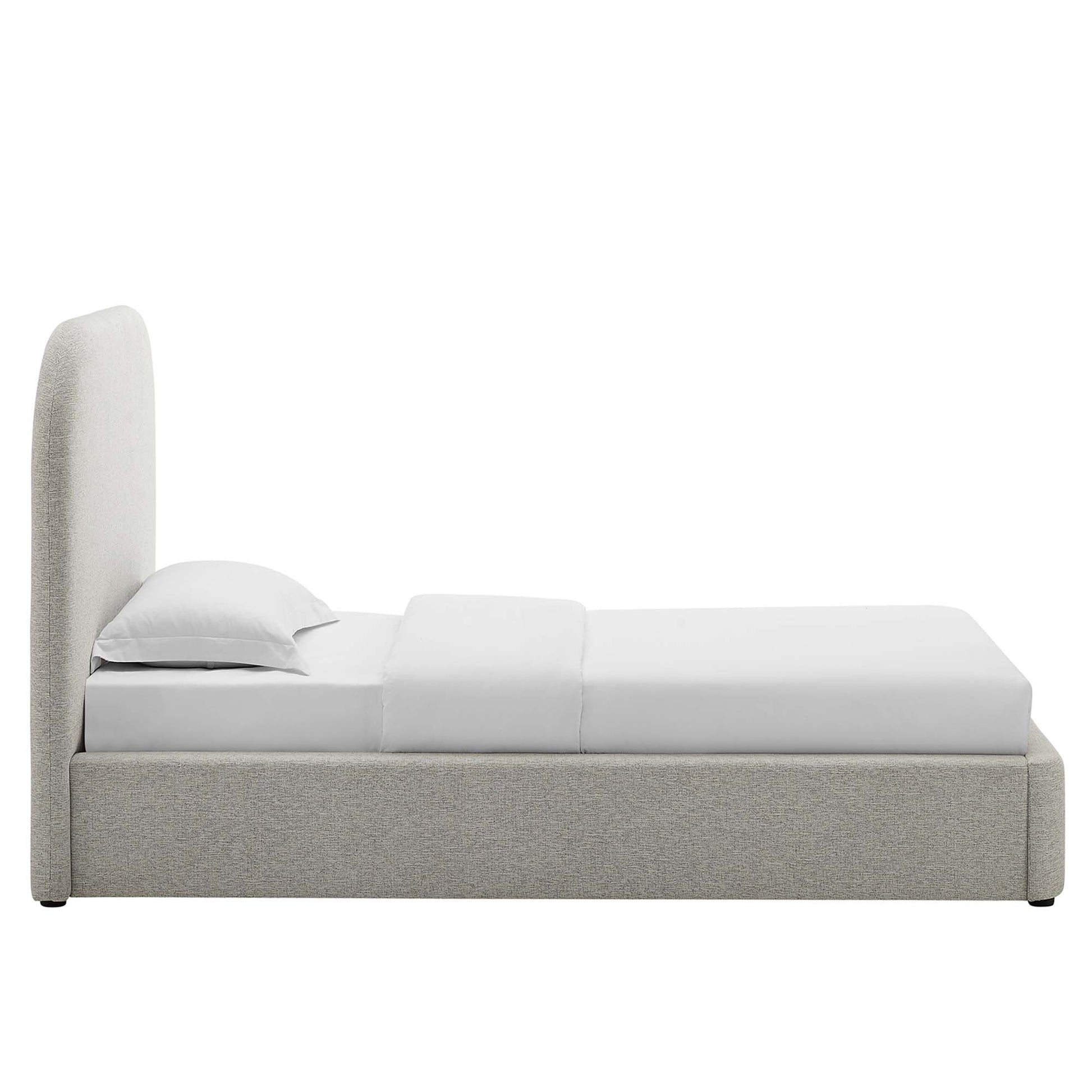 Grey upholstered platform bed with tall curved headboard and white bedding.