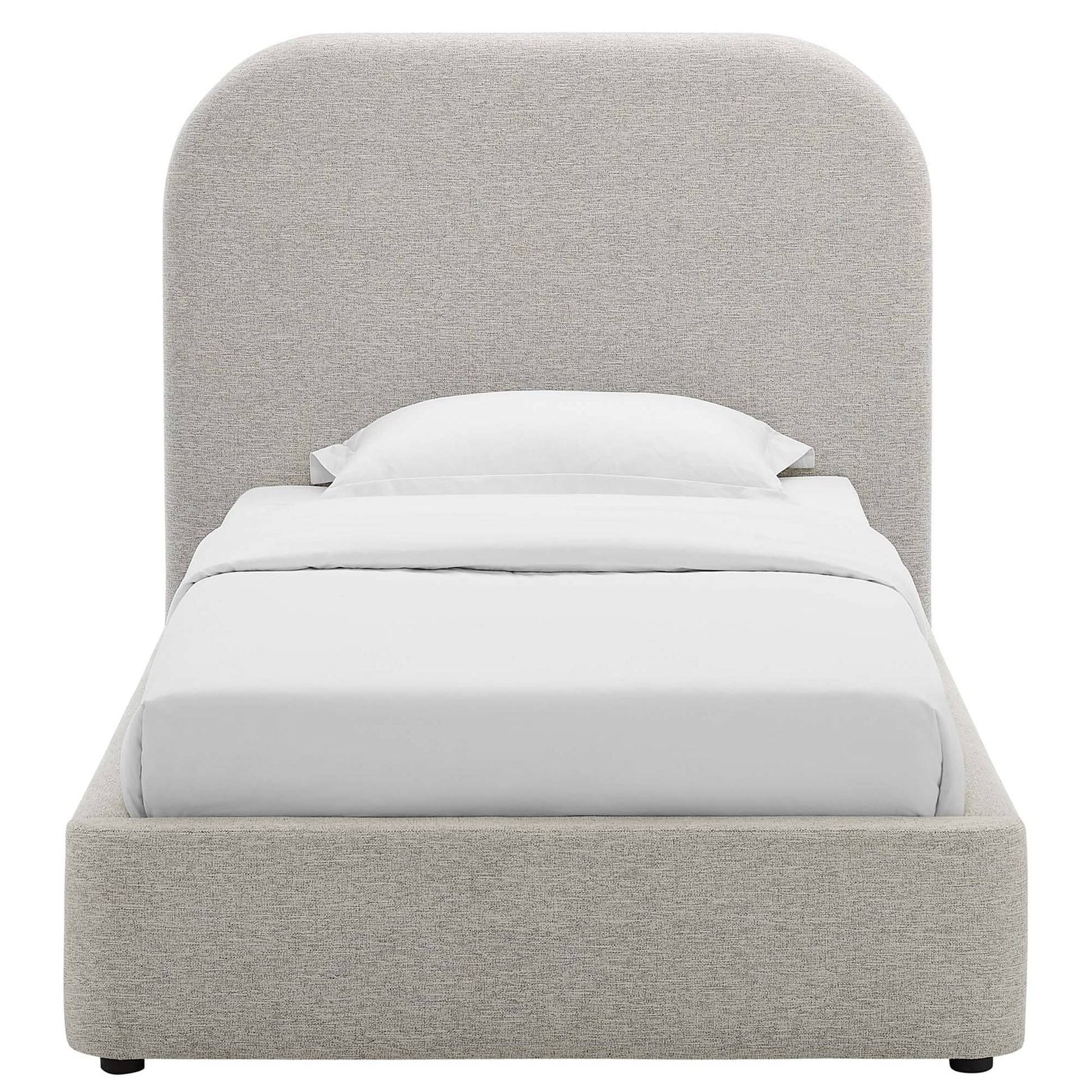 Gray upholstered twin platform bed with curved headboard and low footboard, white bedding.
