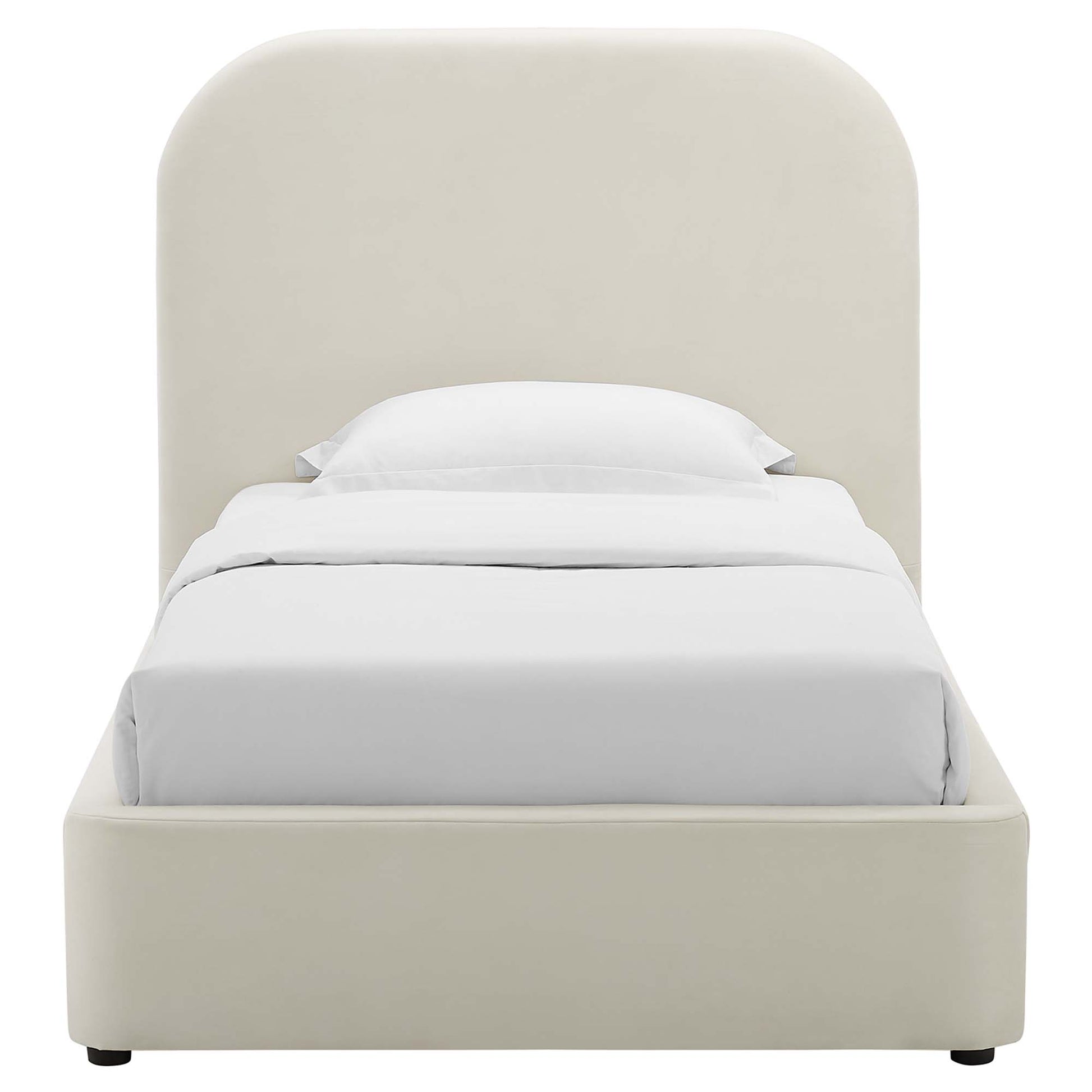 White upholstered platform bed with a curved padded headboard and white bedding.