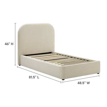 White upholstered twin platform bed with curved headboard, low rails, and wooden slats.