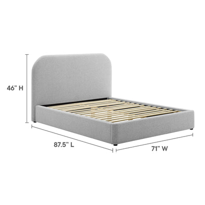 Gray fabric upholstered platform bed with rounded headboard and wooden slat base