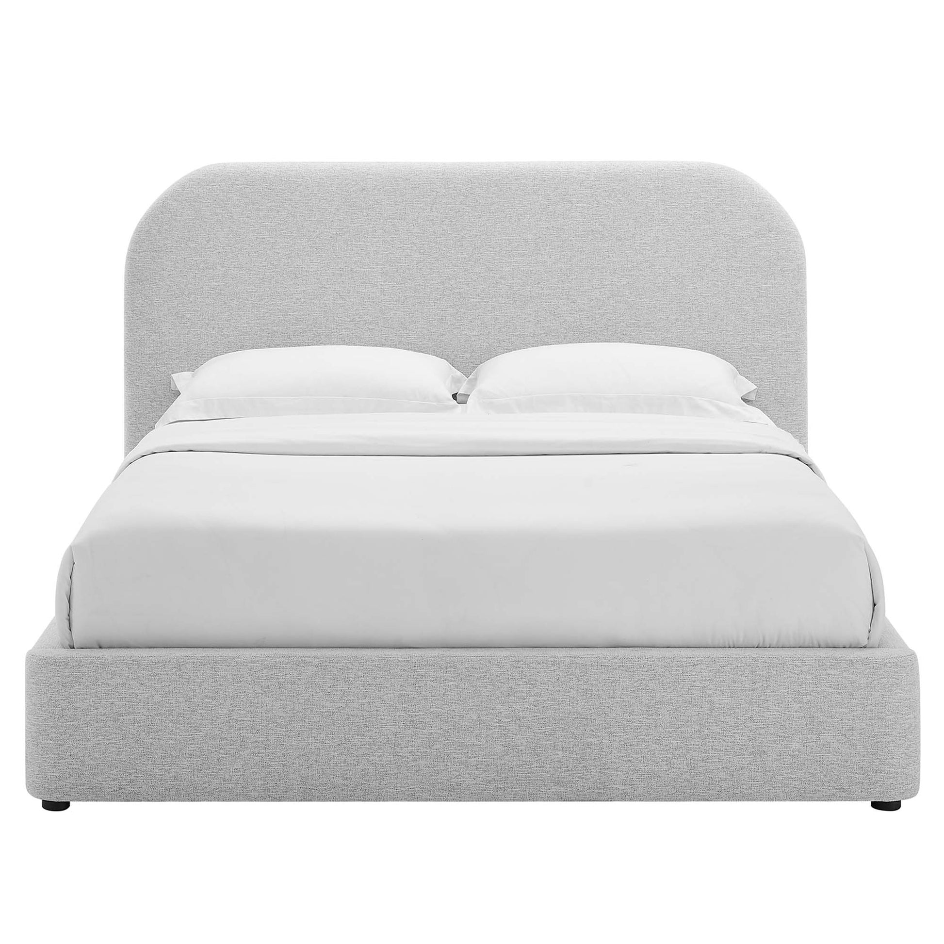 Grey upholstered platform bed with a rounded high headboard and white bedding.