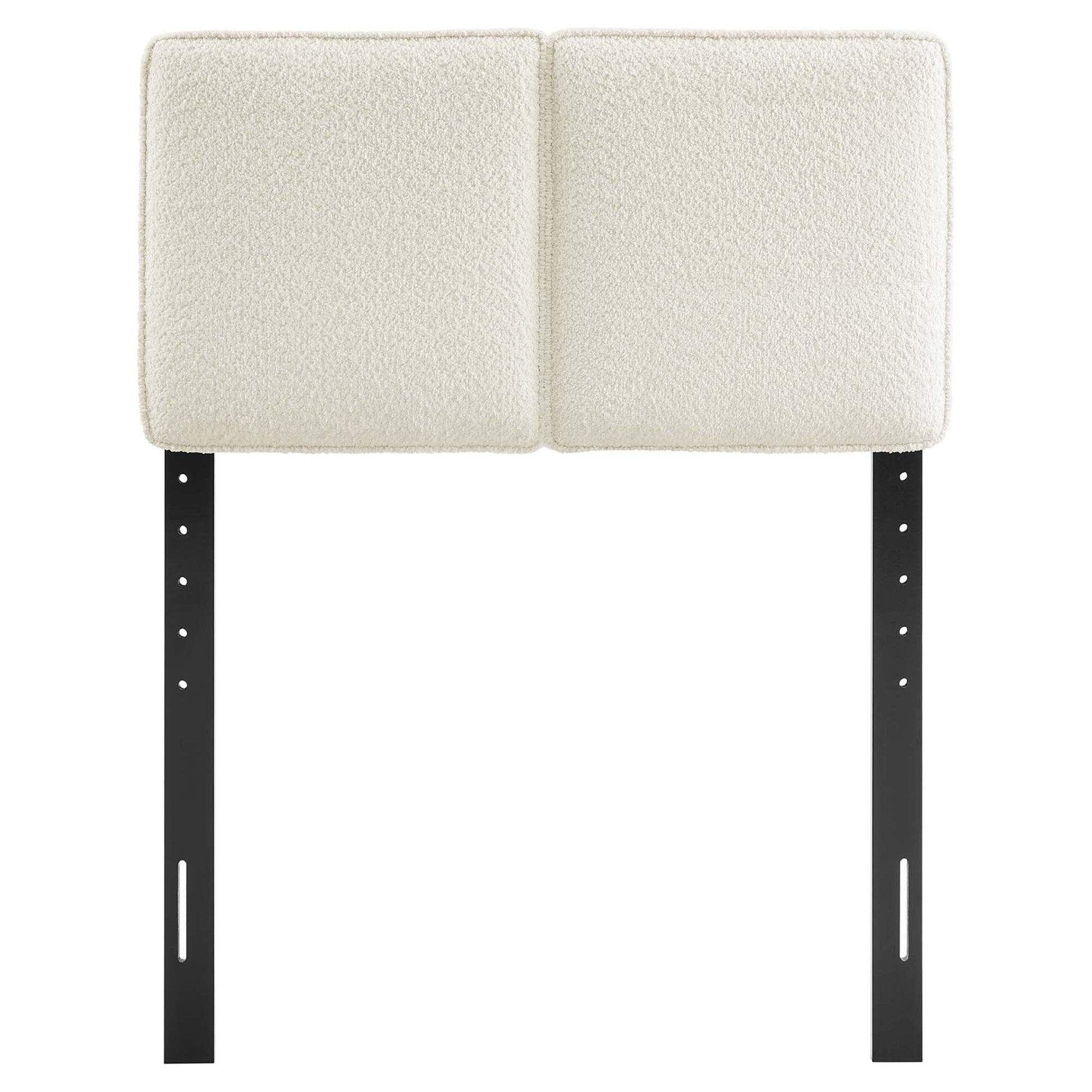 Cream boucle fabric twin headboard with padded, square panels.