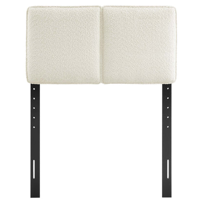 Cream boucle fabric twin headboard with padded, square panels.