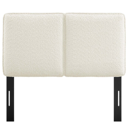 Cream boucle two-panel headboard with black metal mounting brackets for bed frame, modern bedroom decor.