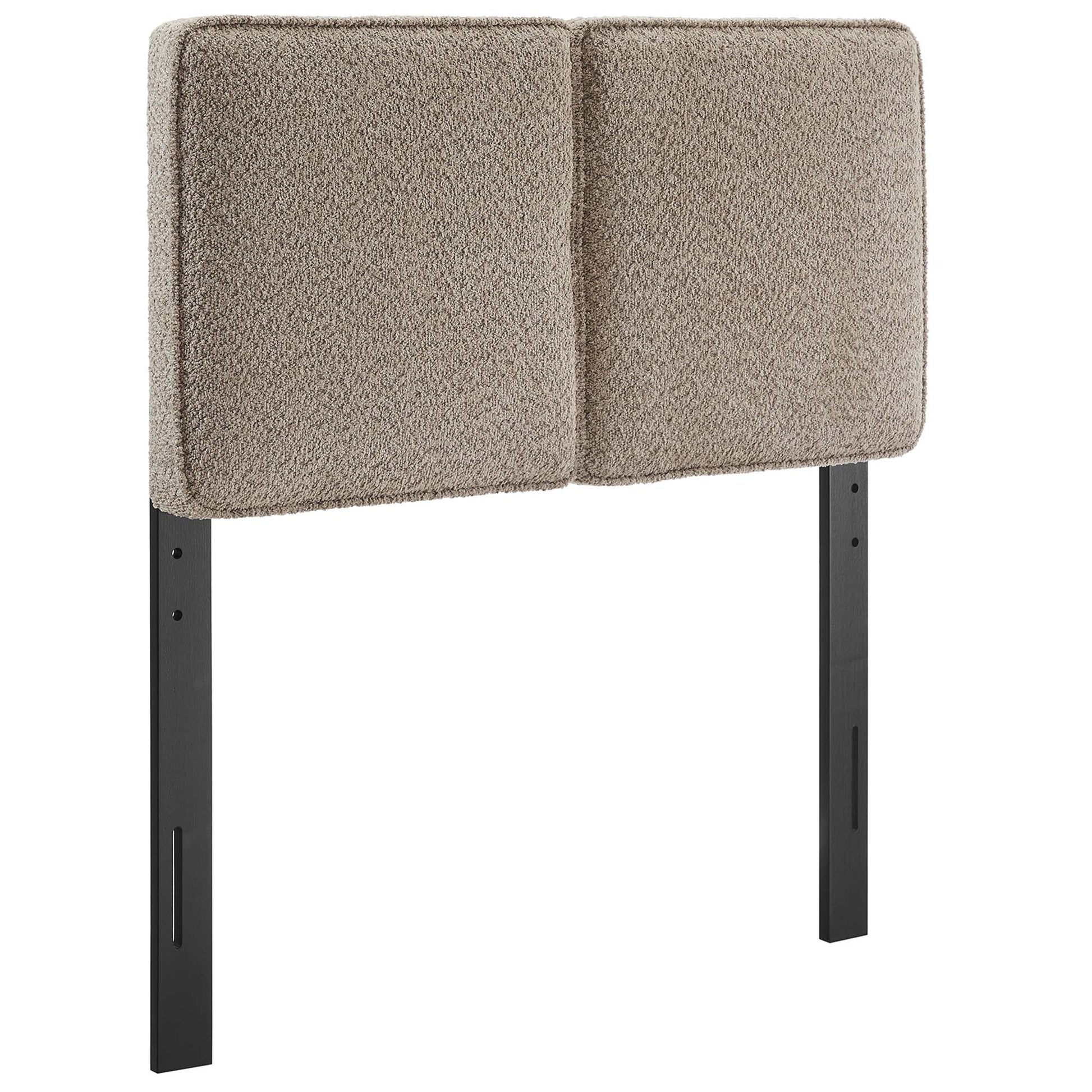 Oatmeal fabric double-panel upholstered twin headboard on black metal posts.