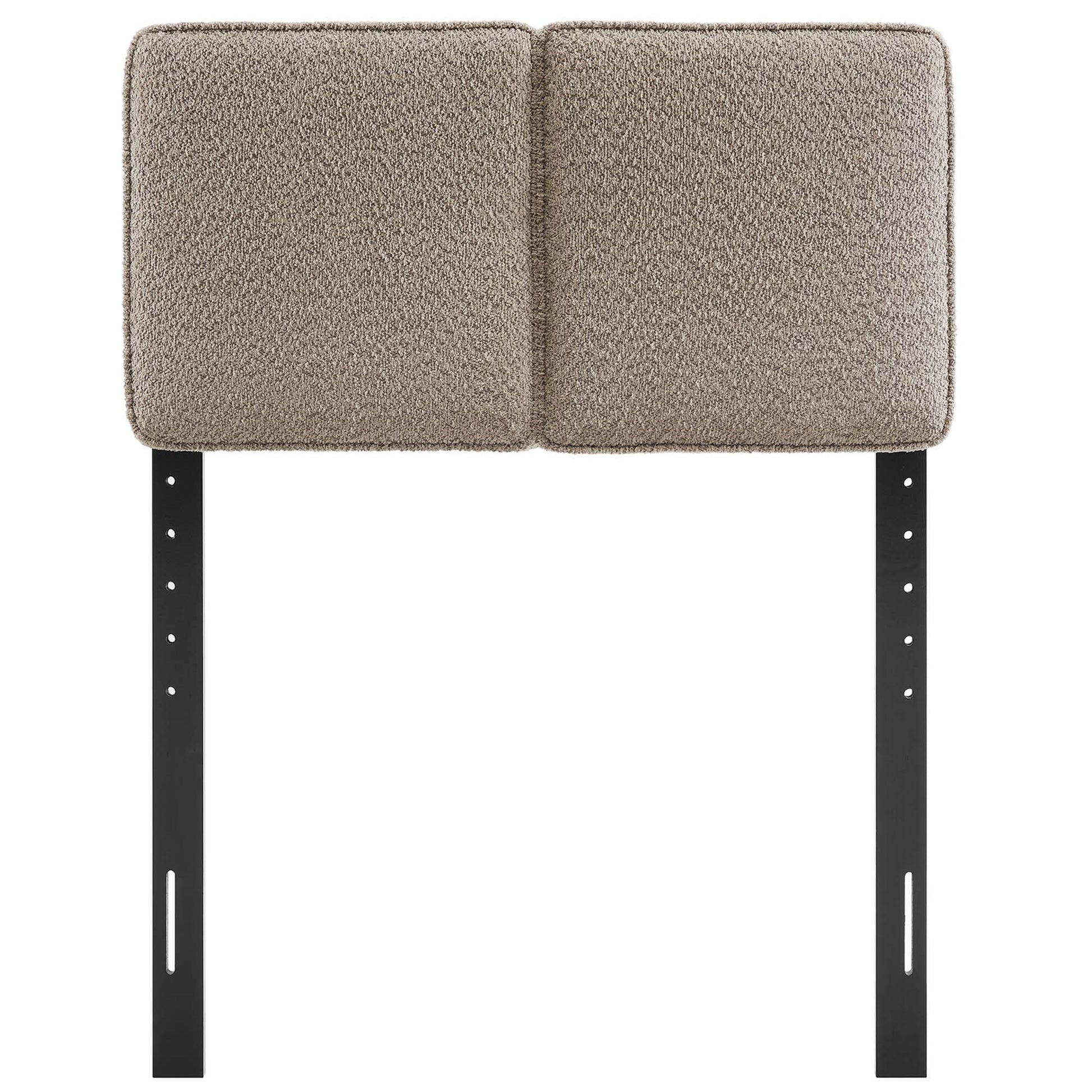 Beige oat two-square cushioned headboard on black metal posts.