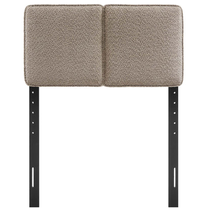 Beige oat two-square cushioned headboard on black metal posts.
