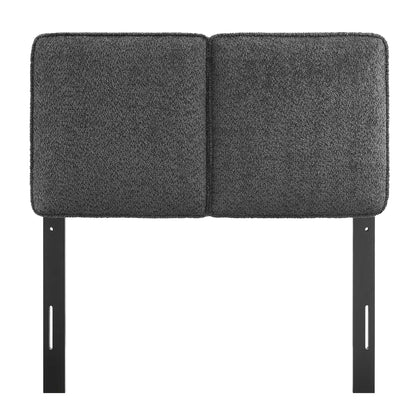 Dark gray boucle fabric twin headboard with an upholstered panel mounted to black metal posts.