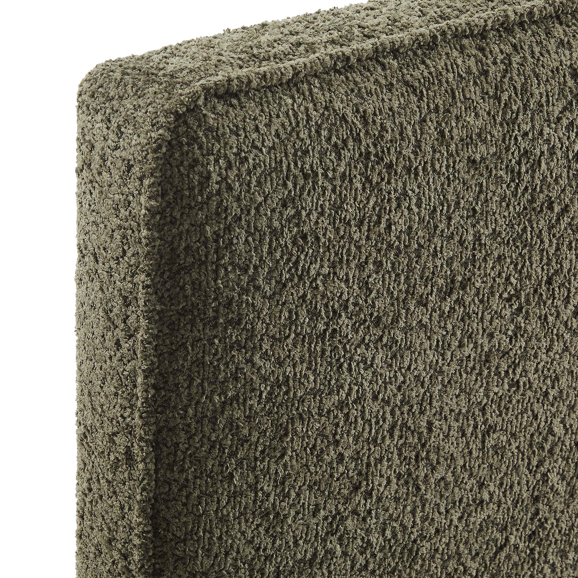 Olive-green boucle fabric headboard with a thick, nubby texture.