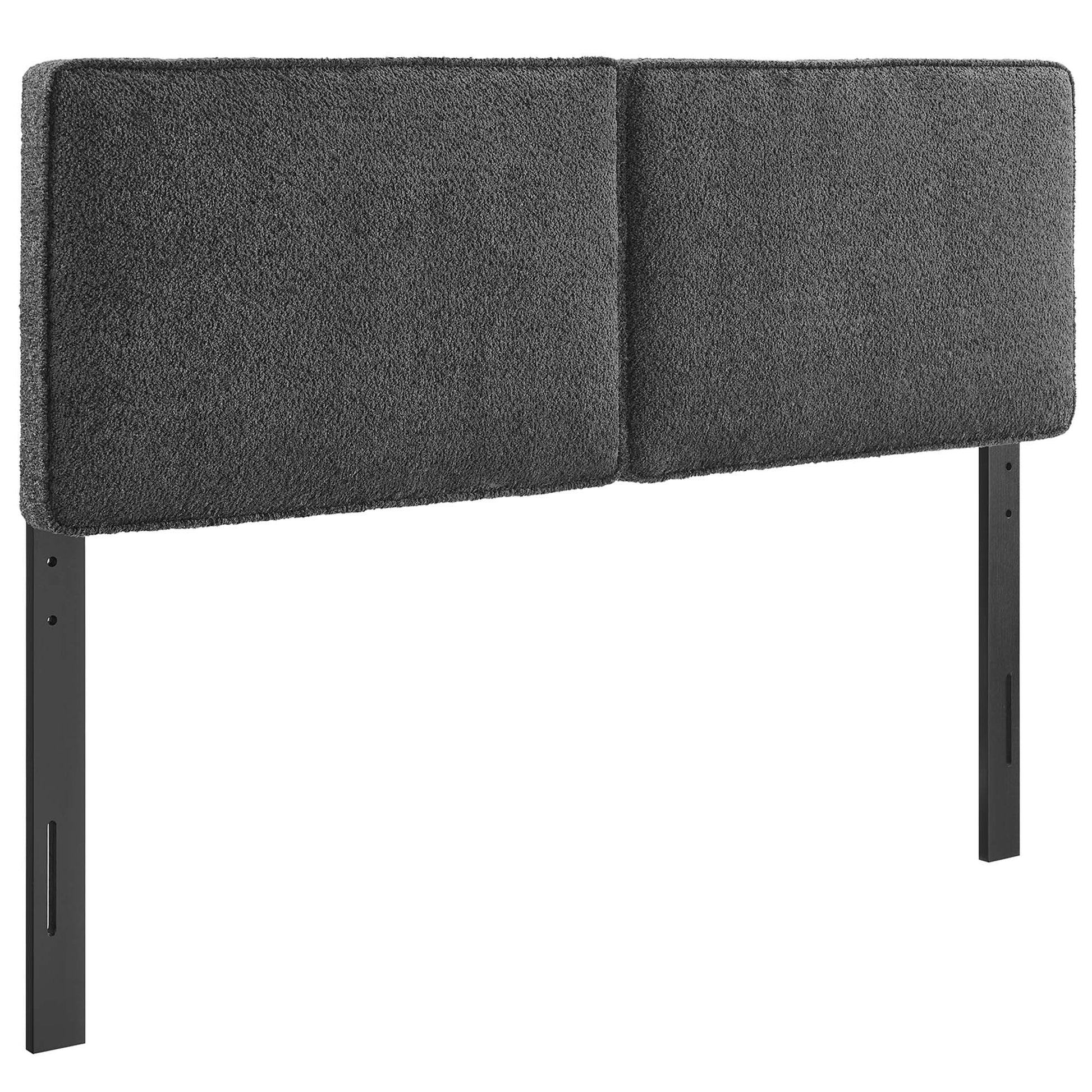 Dark gray fabric upholstered two-panel headboard on slim black metal legs; modern minimalist bed decor.