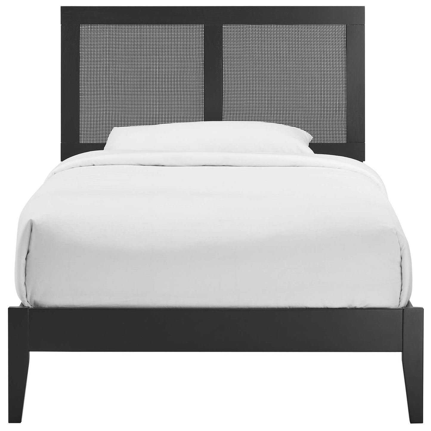 Black platform bed frame with two woven cane headboard panels and white bedding.