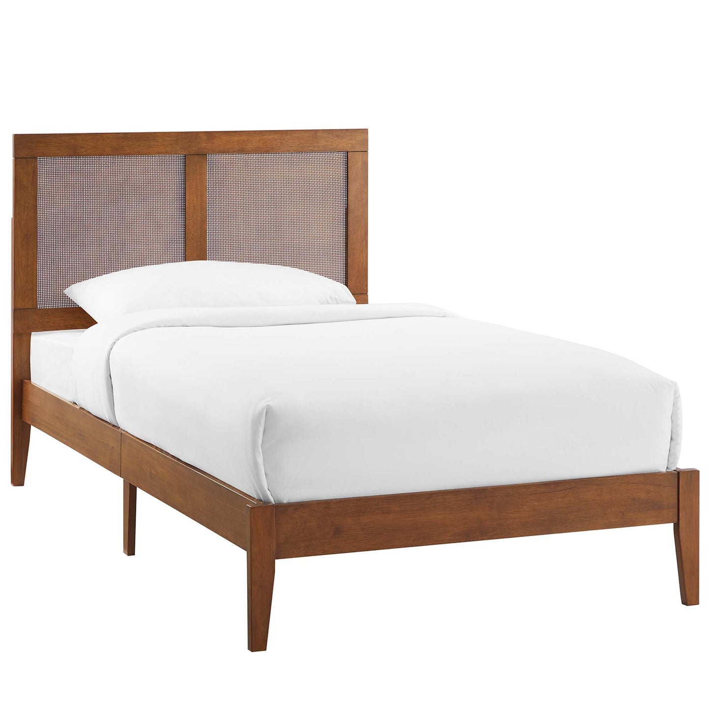 Rattan and wood twin platform bed with a woven headboard, white bedding, mid-century modern design.