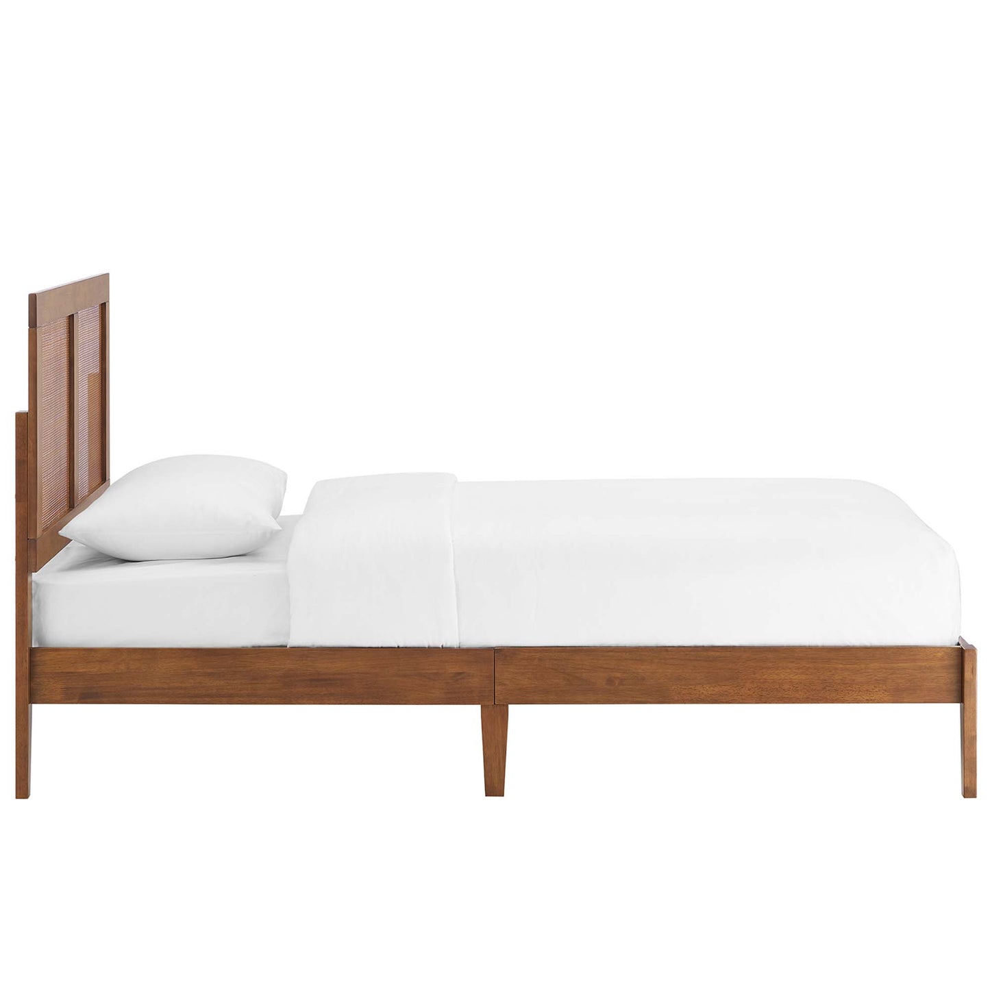 Walnut wood platform bed with a rectangular headboard panel and tapered legs, dressed in white bedding.