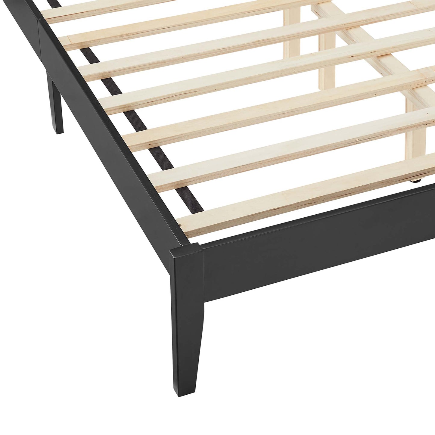 Black full-size platform bed with rattan and wood elements; low-profile, minimalist design.