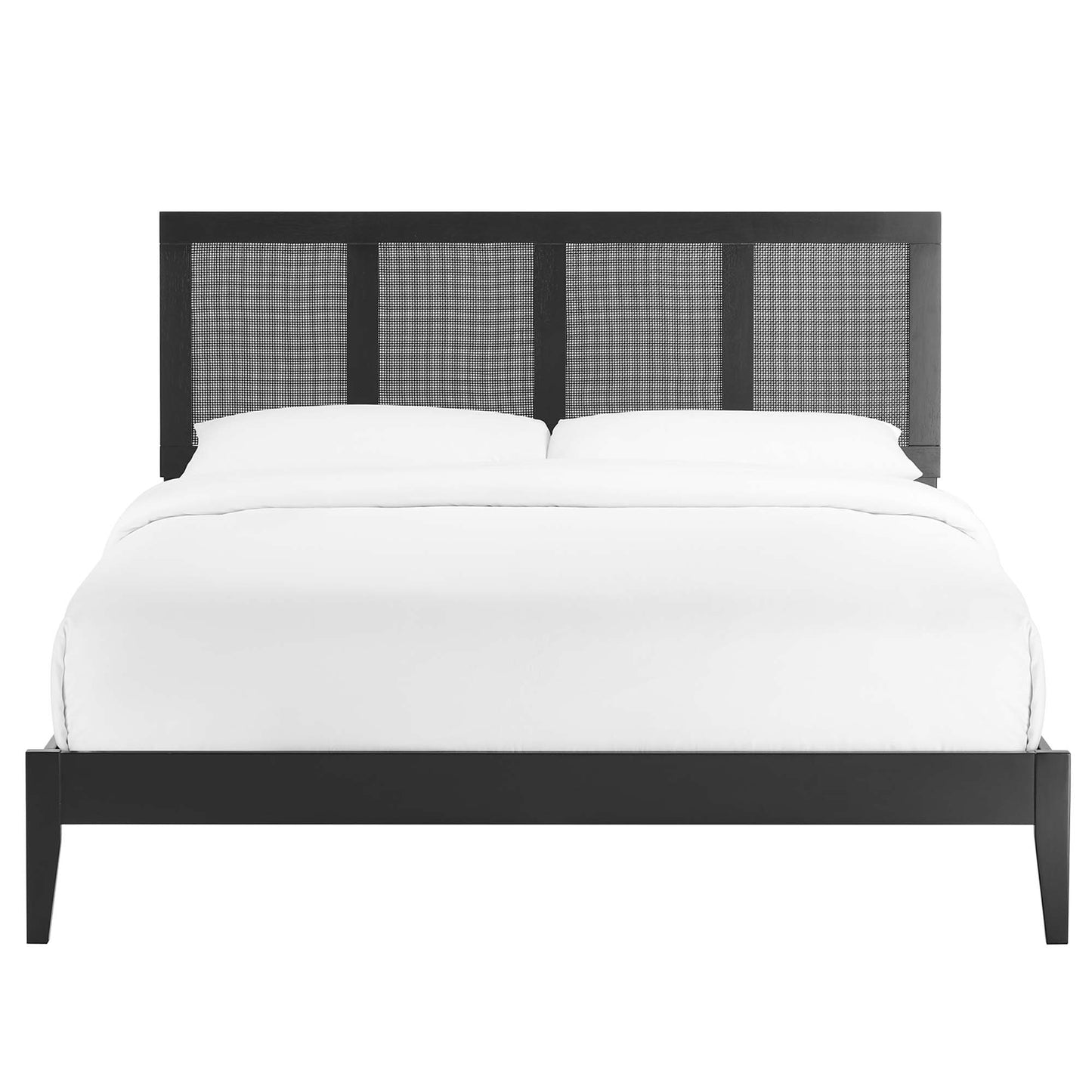 Black platform bed with paneled headboard featuring gray woven panels, white comforter and pillows.