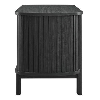 Black wood nightstand with vertical slats, rounded top and curved base; modern compact bedside or living-room accent.