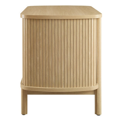 Oak-finished open nightstand with a curved front, vertical slats and rounded edges, mid-century modern bedside storage.