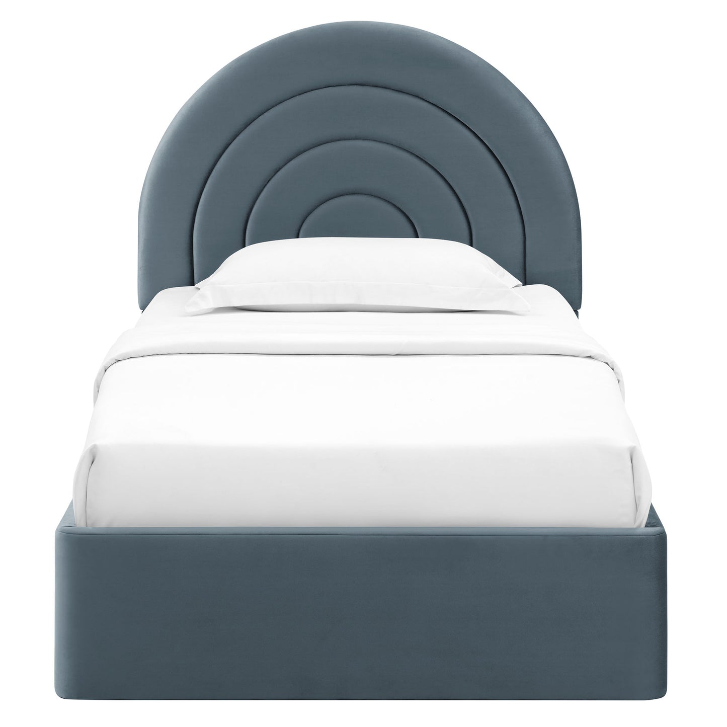 Blue-gray upholstered bed with a concentric arc headboard and white bedding.
