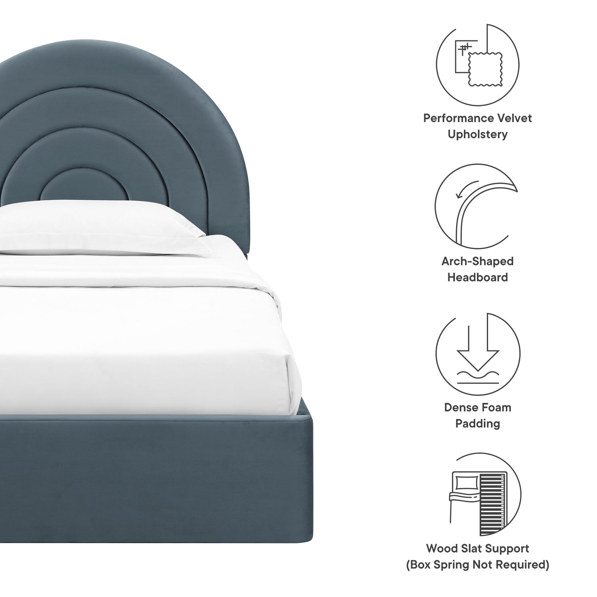 Blue-gray velvet arch-shaped headboard with concentric curves, white bedding, twin platform bed frame.