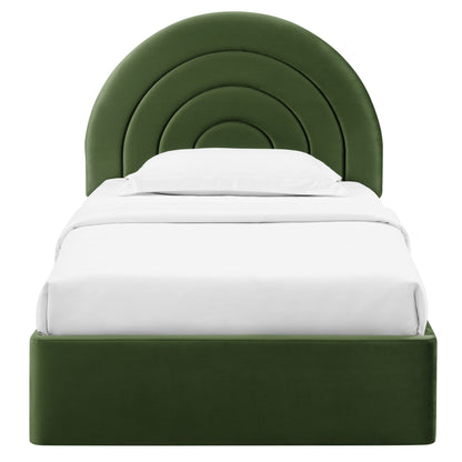 Emerald green velvet twin platform bed with a layered concentric arc headboard and white bedding.