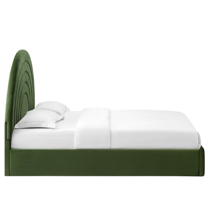Green fabric upholstered platform bed with a tall curved arch headboard and white bedding.