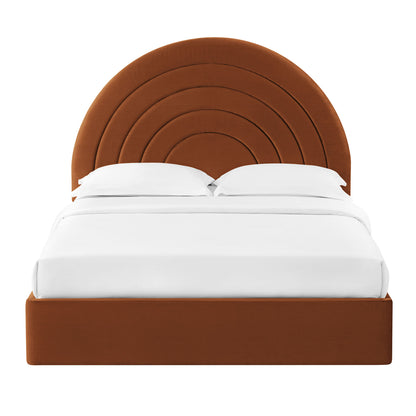 Rust brown upholstered bed with concentric circular arched headboard and white bedding.