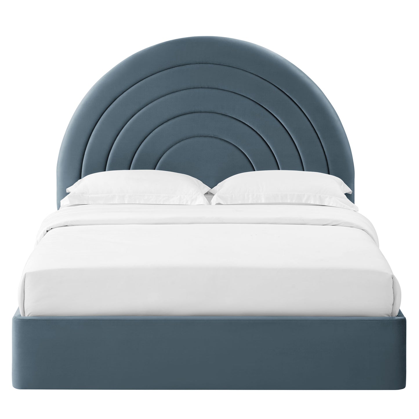 Blue upholstered platform bed featuring a rounded concentric-arc headboard & white bedding.