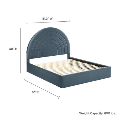 Dark blue bed frame with a tall arched, concentric headboard and light wood slat foundation; modern platform bed.