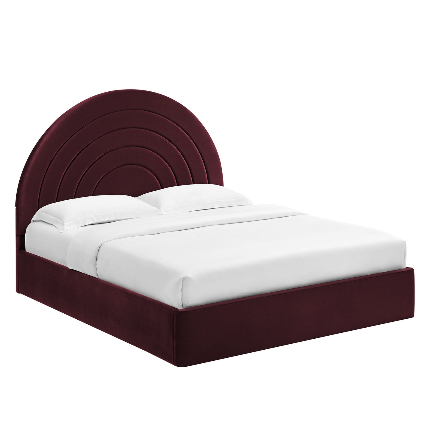 Purple velvet platform bed with a curved, multi-arch headboard and white bedding.