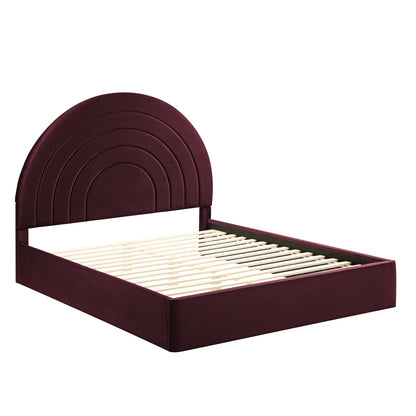 Burgundy velvet upholstered bed frame with a semicircular arched headboard and wooden slat base.