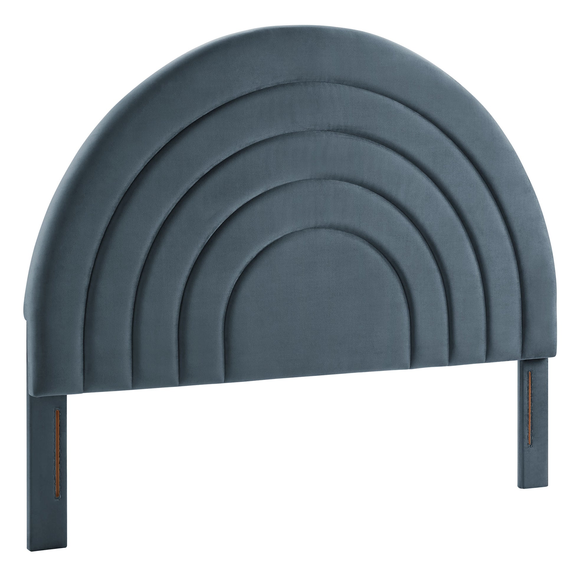 Blue velvet upholstered arched headboard with stacked curved panels and attached legs.