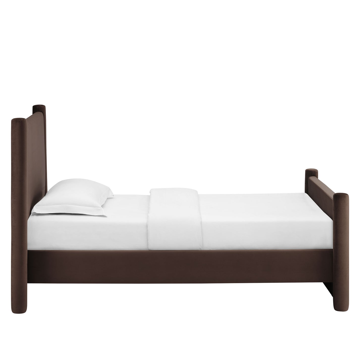 Dark brown velvet twin platform bed with tall rounded posts and white bedding.