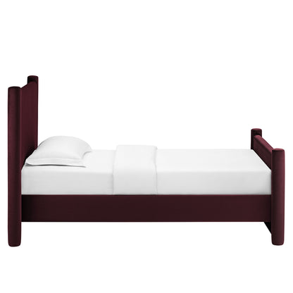 Twin-size purple upholstered platform bed with tall corner posts and white bedding.
