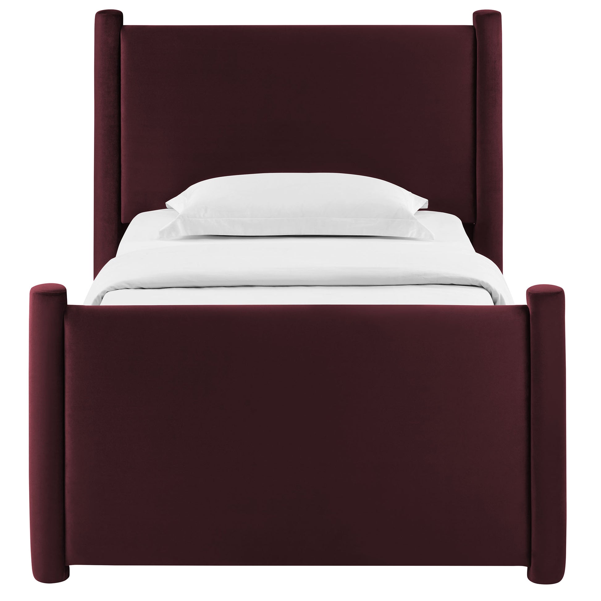 Maroon velvet upholstered bed with tall padded headboard and cylindrical corner posts, white bedding.