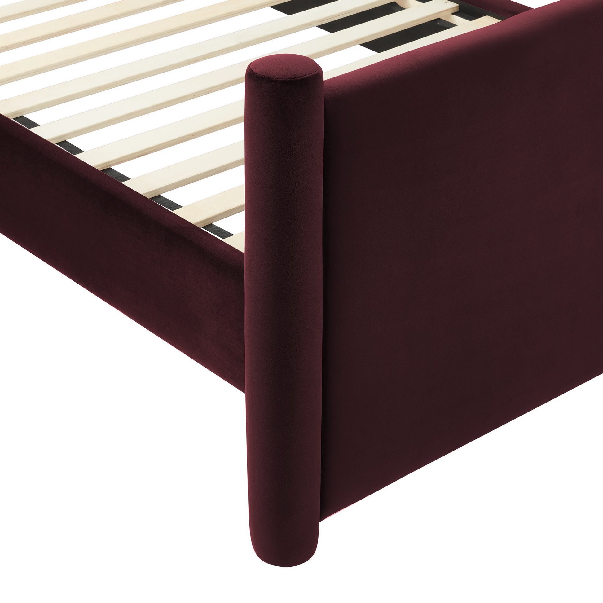 Purple upholstered full platform bed with rounded cylindrical leg and side panel, showing wooden slats.