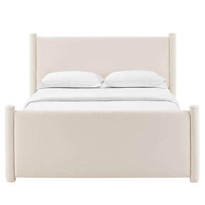 Beige upholstered bed with tall headboard, rounded posts, and white bedding.
