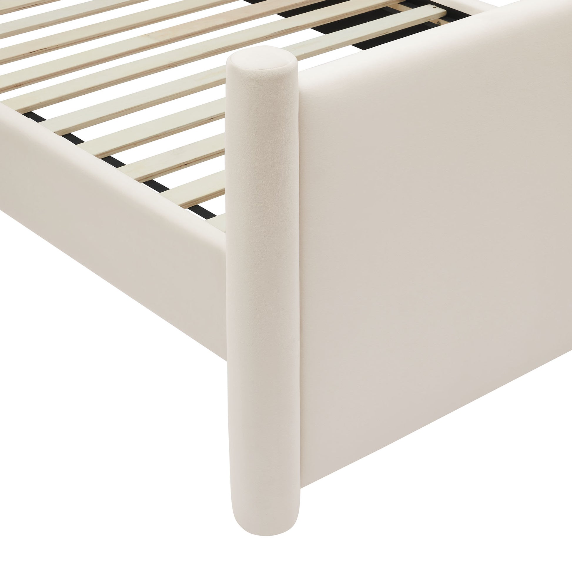 Ivory velvet upholstered queen platform bed.