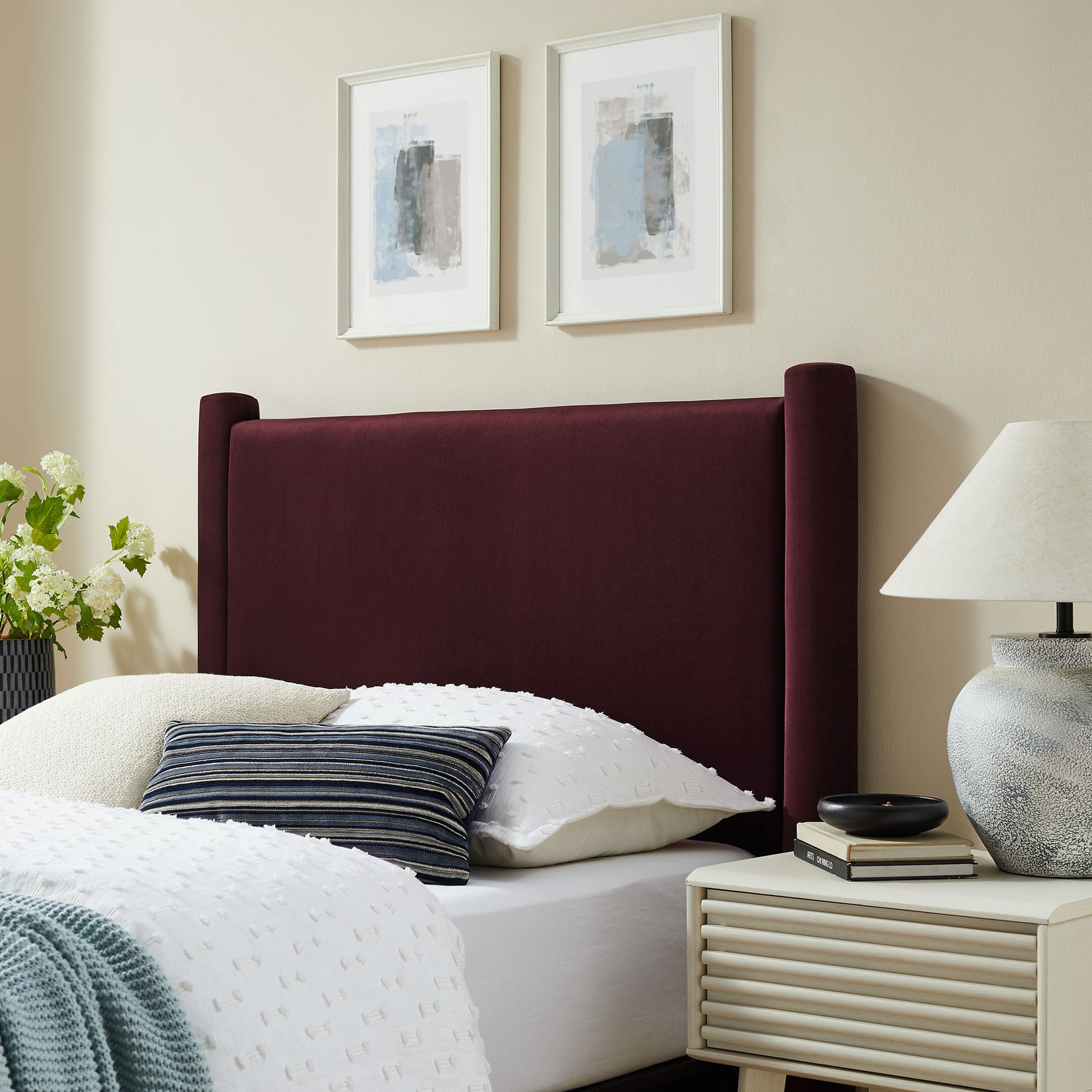 Purple velvet upholstered tall twin headboard.