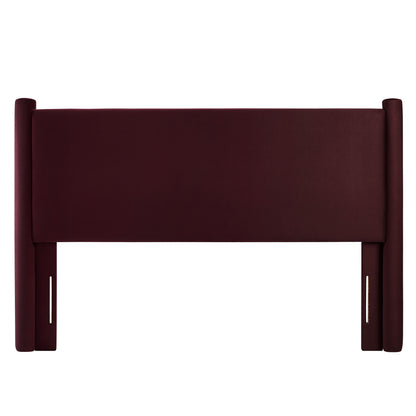 Wine red upholstered bed headboard with padded central panel and tall rounded side posts.