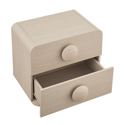 Light ash wood two-drawer bedside nightstand with rounded edges and circular knobs; bottom drawer open.