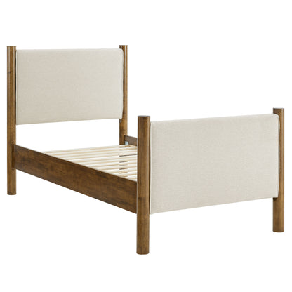 Ivory fabric upholstered twin platform bed with padded headboard and footboard.