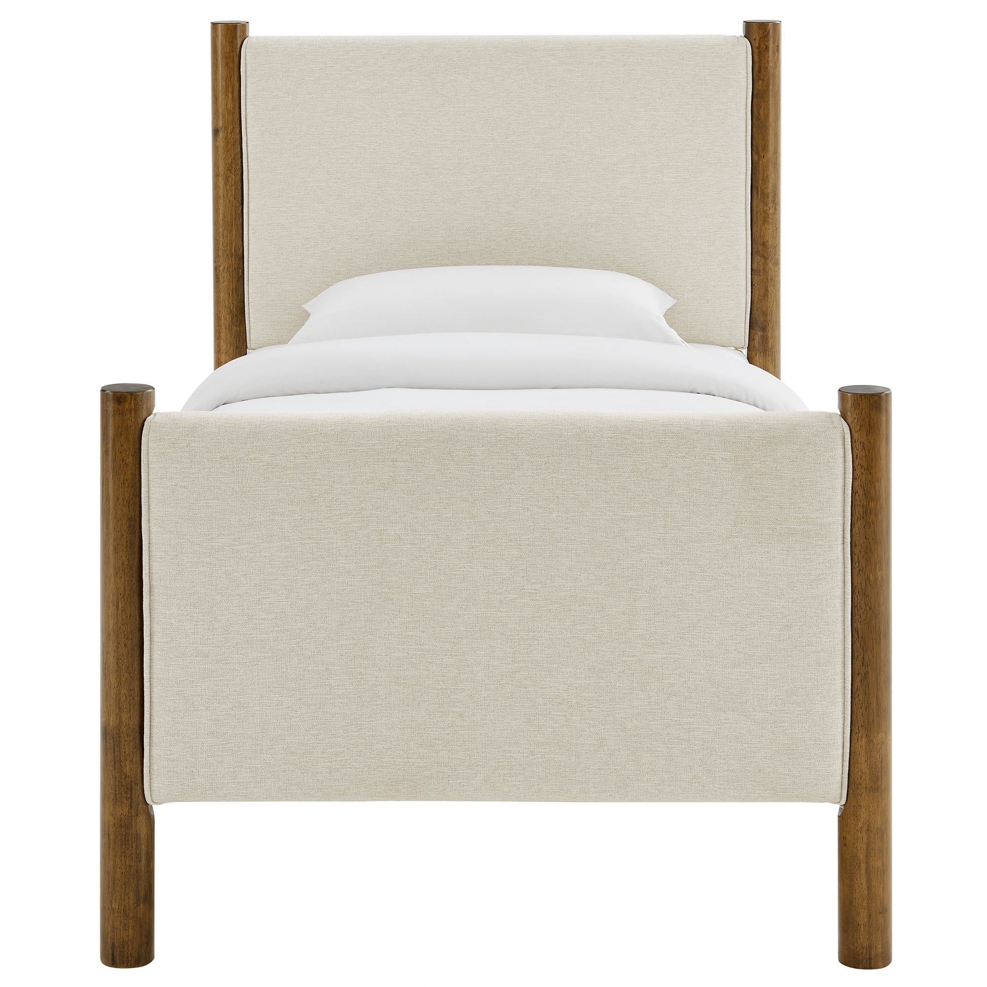Beige fabric upholstered four-poster bed with walnut posts and white bedding.