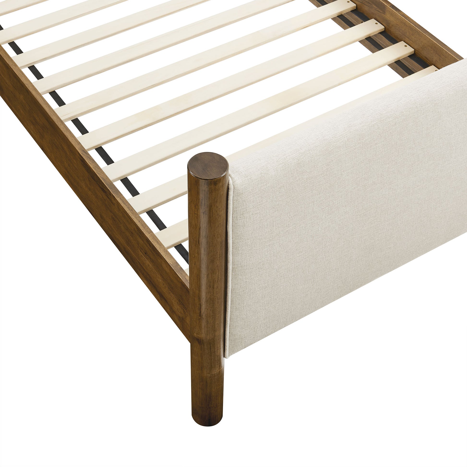 Ivory fabric-upholstered platform bed with a slatted base and footboard panel.