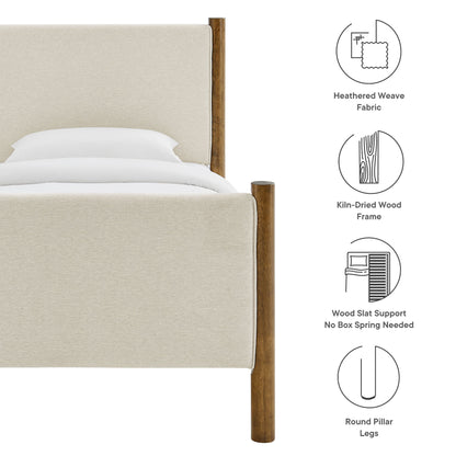 Beige upholstered bed with walnut round pillar legs and wood frame; heathered weave fabric & wood slat support.