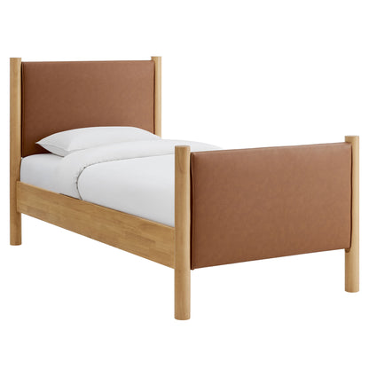 Twin bed frame in light oak with tan upholstered headboard and footboard.