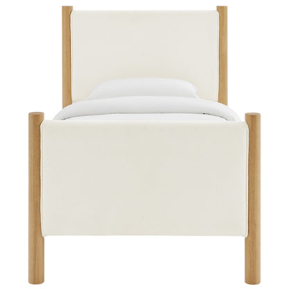 Cream upholstered bed with oak posts and rectangular headboard, minimalist modern style.