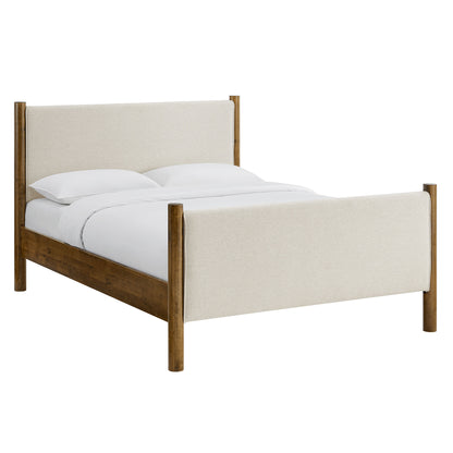 Beige upholstered platform bed with natural wood posts and rails, white bedding.