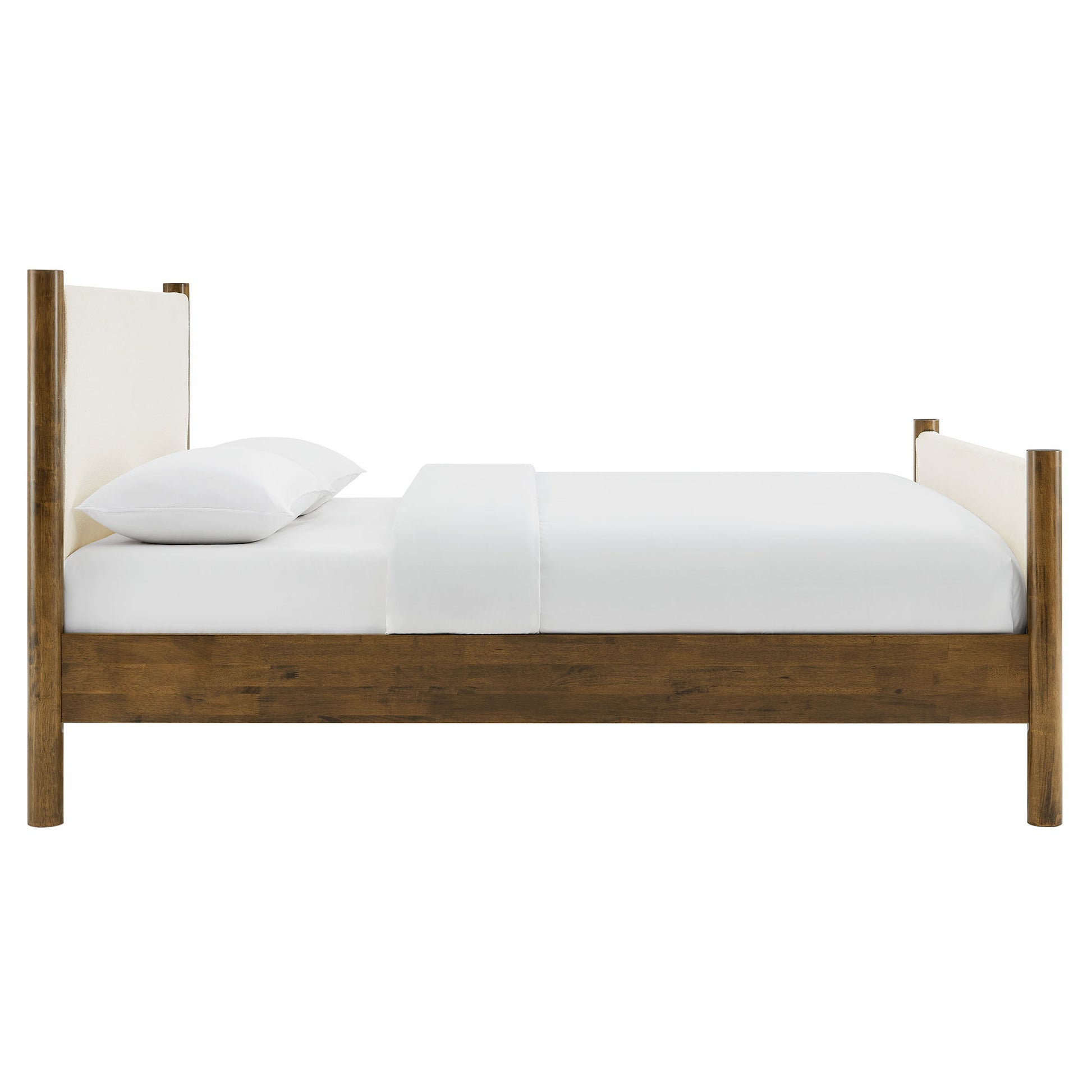 Ivory boucle upholstered full-size platform bed with white mattress and linens; simple design.