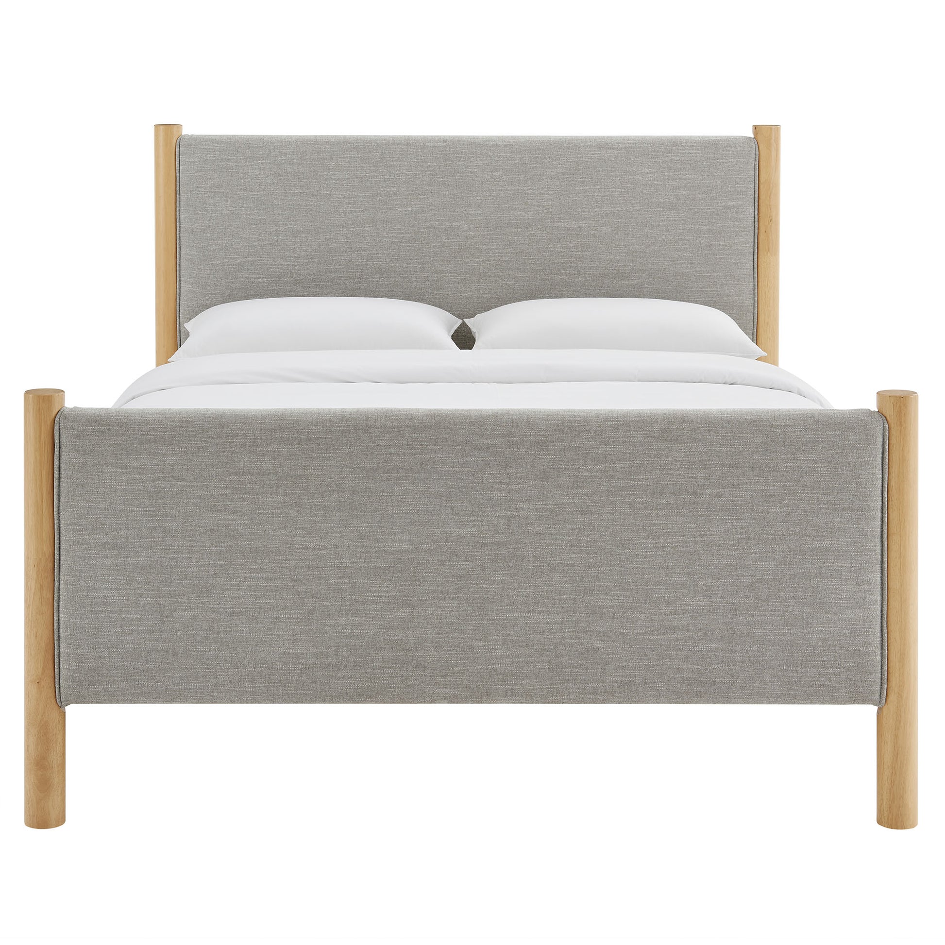 Oatmeal fabric upholstered platform bed with natural oak posts, headboard and footboard, white bedding.